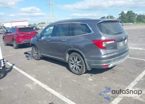 2019 Honda Pilot Touring z USA, uszkodzony, nr VIN 5FNYF5H62KB037420